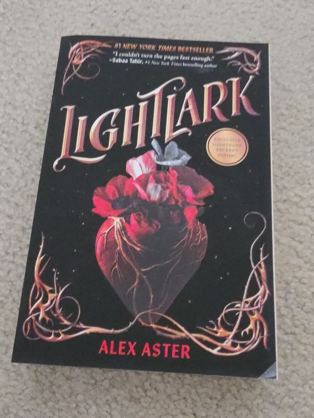 Lightlark by Alex Aster — Black Cover with Red Accents